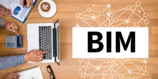 BIM Schriftzug Laptop Schreibtisch