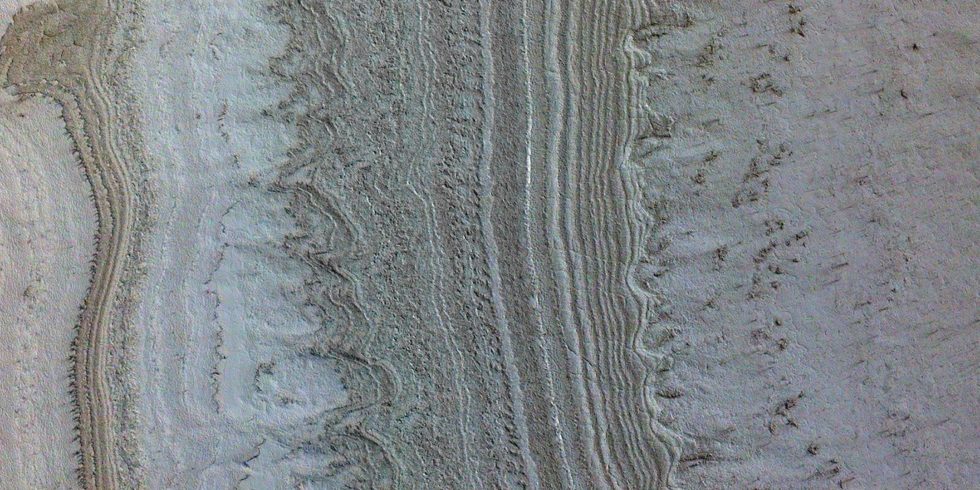 Flüssiges Wasser und Leben auf dem Mars? Forscher haben jetzt eine neue Theorie, was  unter dem Eis zu finden ist. Foto: NASA/JPL-Caltech/University of Arizona/JHU