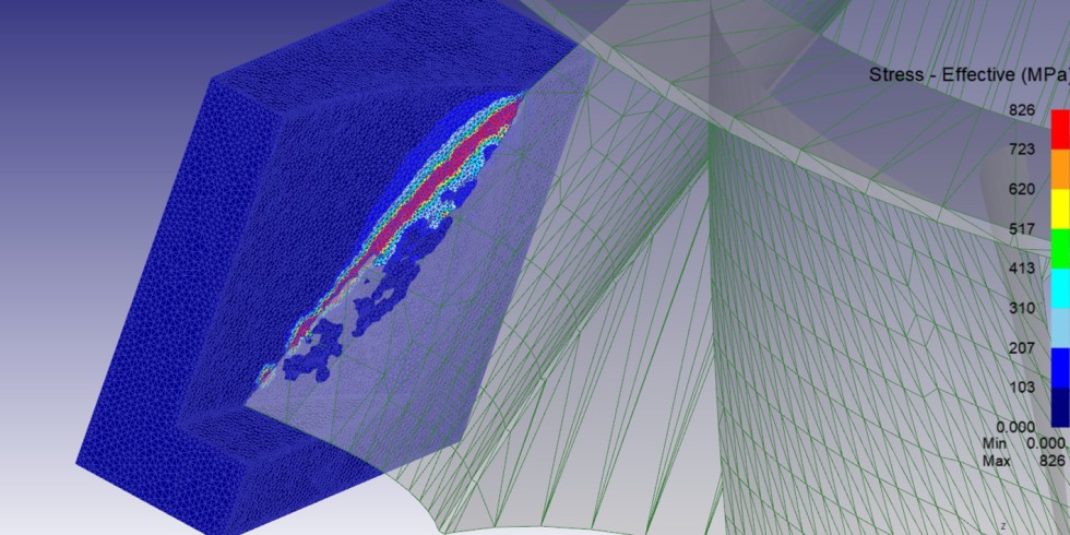 Simulation eines Fräsprozesses mit der Software "Deform": Zu sehen ist die Spanbildung (in der Mitte) durch den Eingriff des Fräsers ( rechts) in das blau dargestellte Werkstück. Grafik: HKA