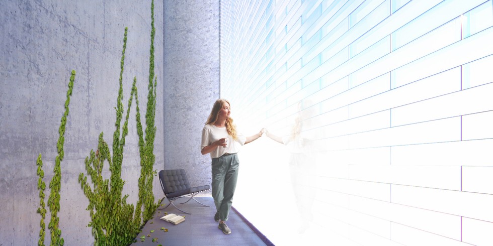 Eine ganze Wand aus Aerogel-Glasbausteinen bringt Tageslicht von draußen in den Innenraum und ist trotzdem hoch islolierend. Foto: Empa