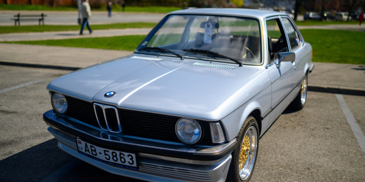 Riga, Latvia May 4 2021: 1979 BMW E21 316 light blue colour with gold rims, Riga,Latvia May 4 2021: