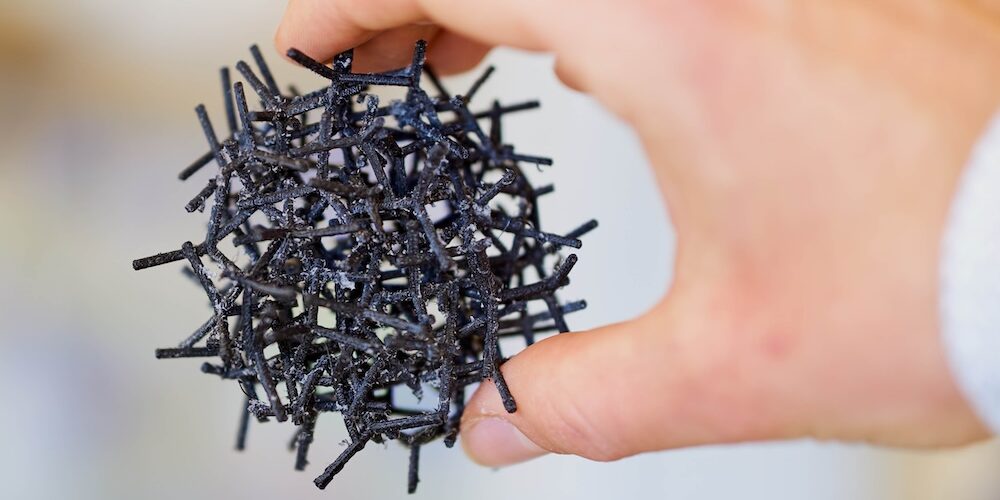 Modell des innovativen neuen Nano-Materials in Form eines Balles