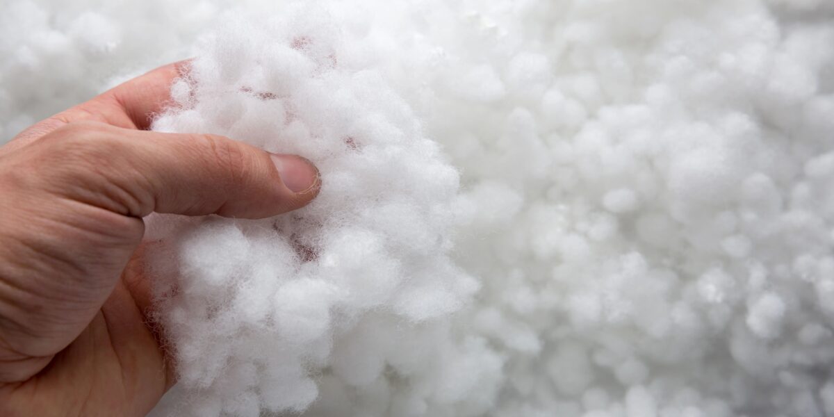 Hand taking synthetic winterizer