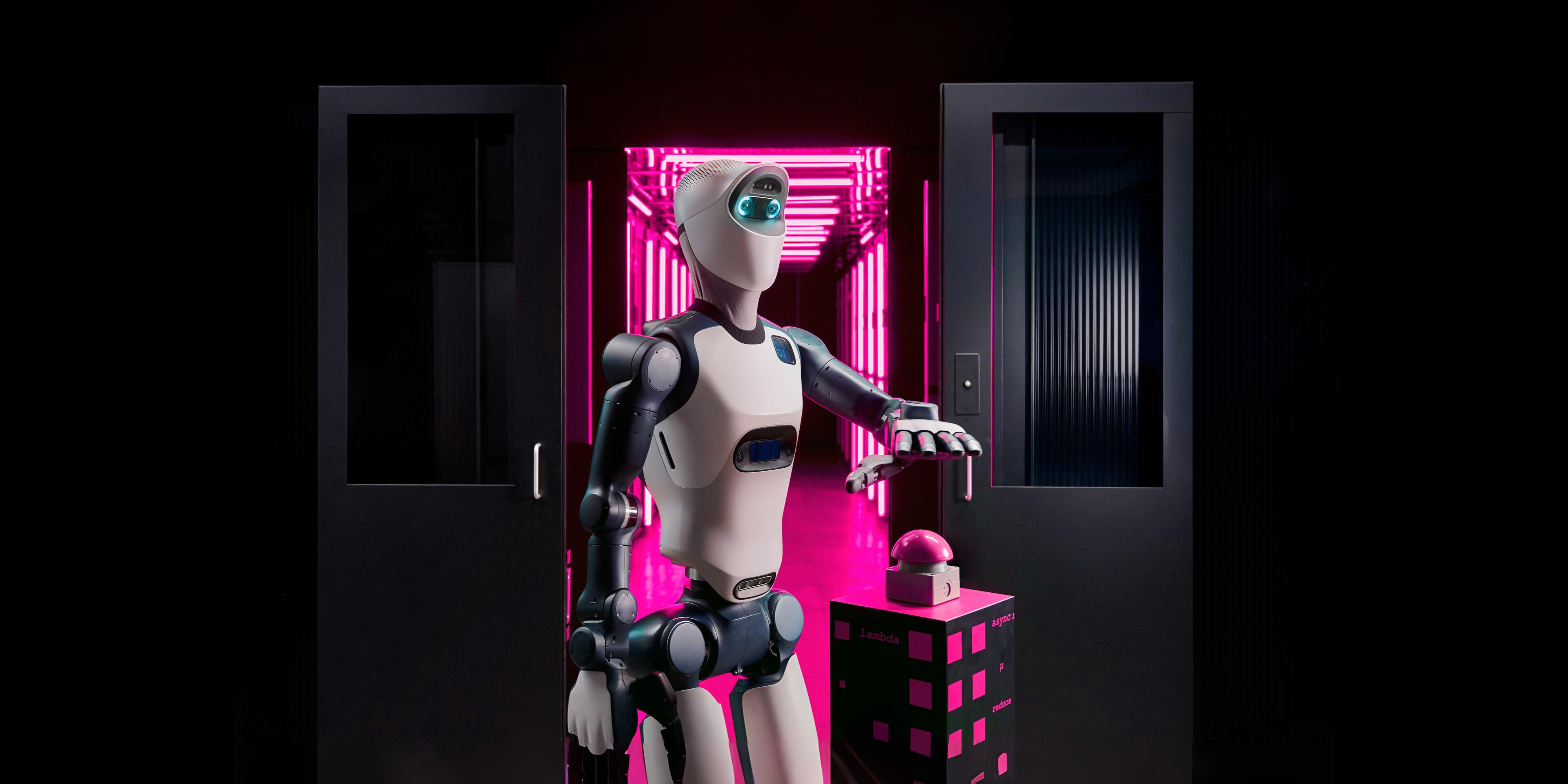 Roboter drückt den Knopf: Industrial AI Cloud gestartet