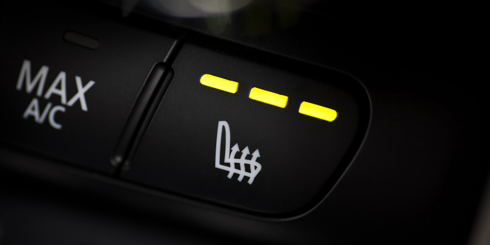 Schalter einer Sitzheizung in einem Pkw