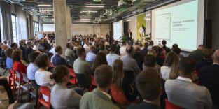 Konferenz für Digitalisierung und KI in der Bauwirtschaft in München mit Fachpublikum