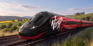 Visualisierung eines rot-schwarzen Virgin-Hochgeschwindigkeitszugs vom Typ Alstom Avelia Stream auf freier Strecke.